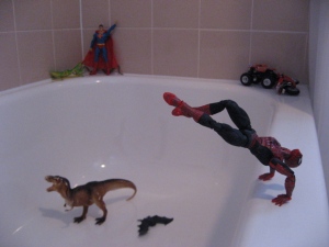 Spiderman vaults into the tub to wage war against T. Rex